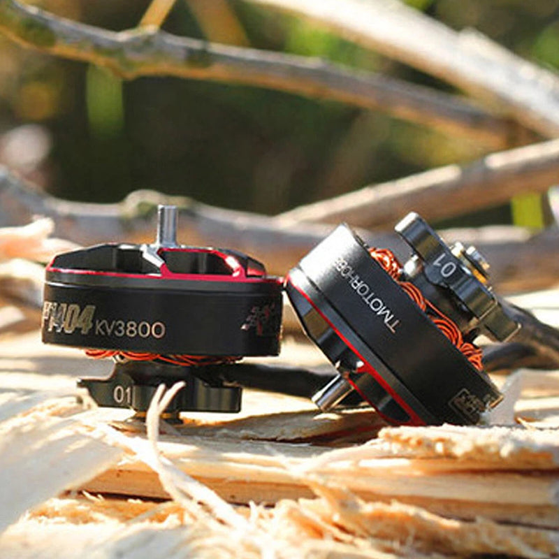T-Motor F1404 brushless FPV motor with red wiring and silver prop shaft