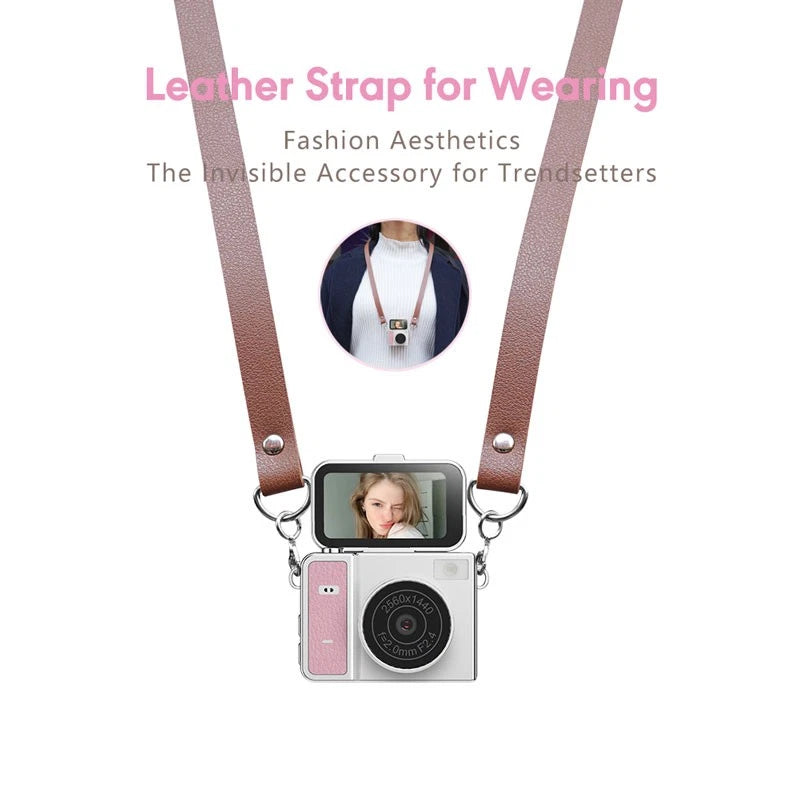 Mini keychain thumb camera with leather strap, pink side panel and small lens