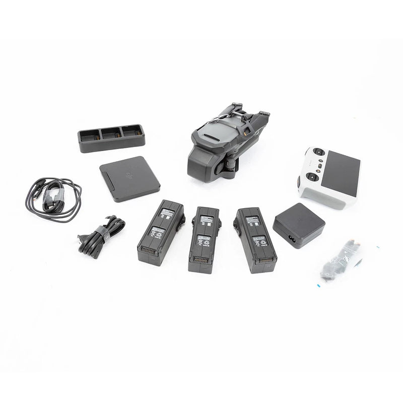 Foldable drone and controller with multiple batteries and charging cables, Fly More set
