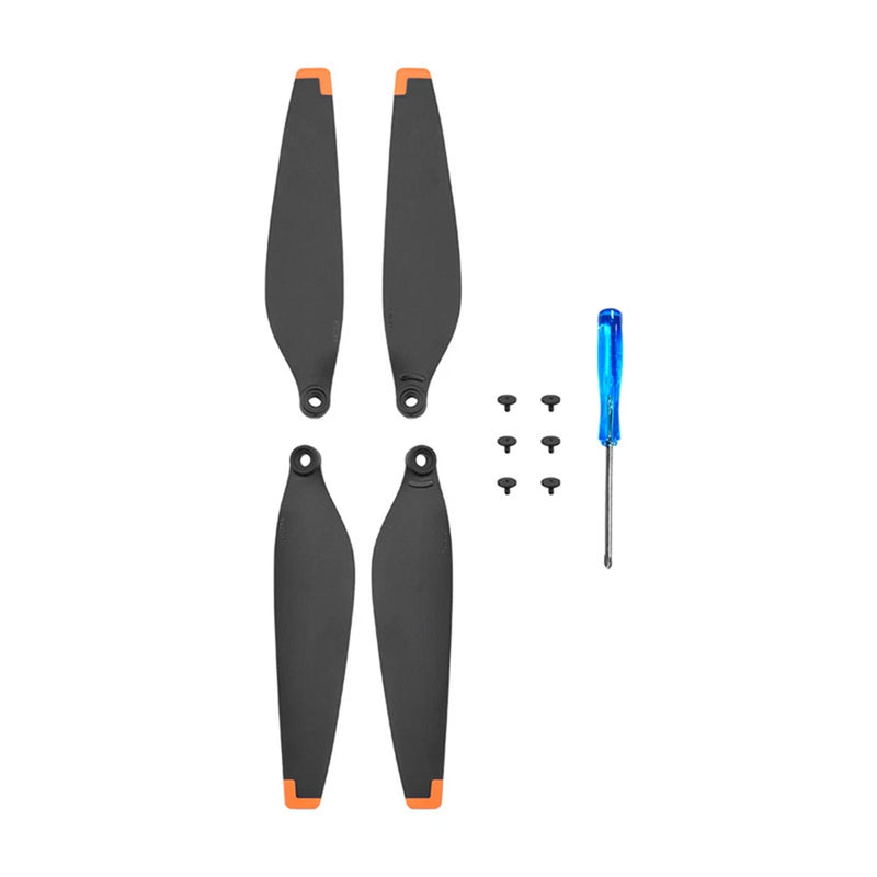 Set of 4 replacement drone propellers with screws and blue screwdriver