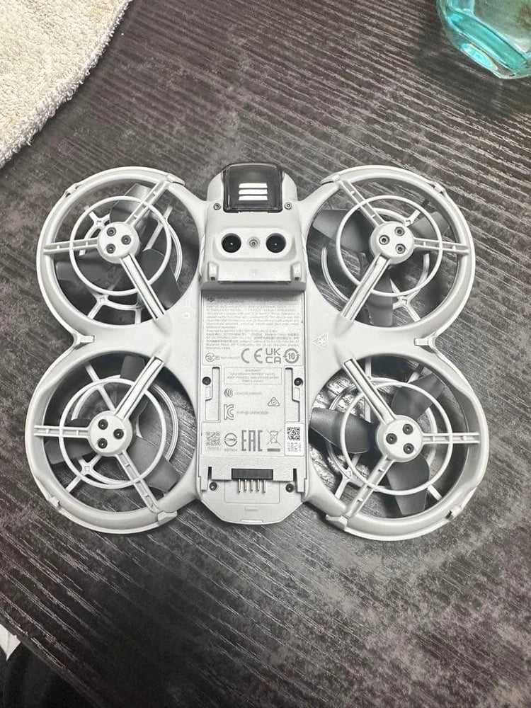 Dji gray ready-to-fly quadcopter drone with four propellers