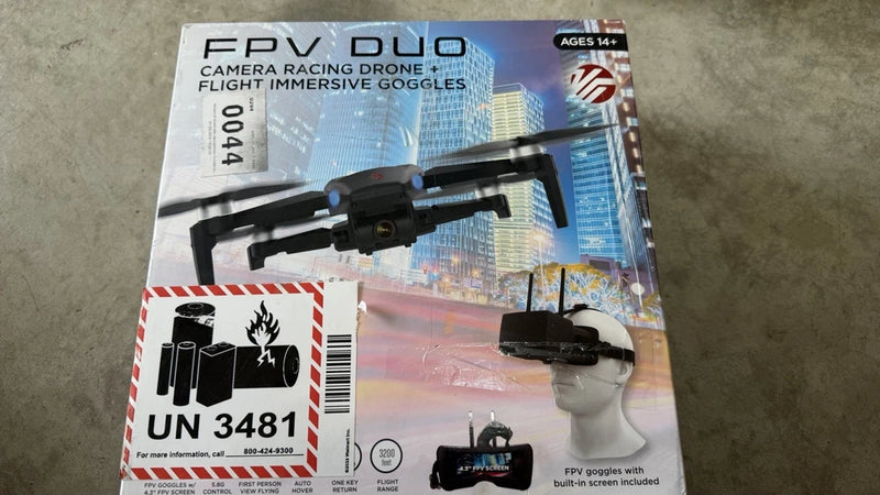 FPV duo racing drone retail box showing black quadcopter and FPV goggles