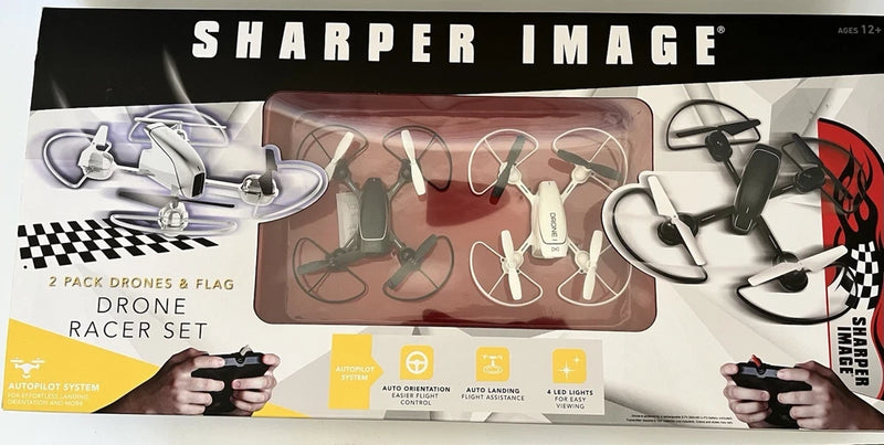Dual drone racer set with remote control, shown in retail box packaging
