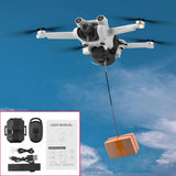 Drone airdrop system kit with drop mechanism releasing an orange package from drone
