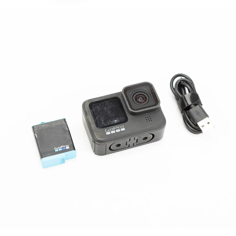 GoPro HERO9 Black action camera with lens module, face buttons, and small front display