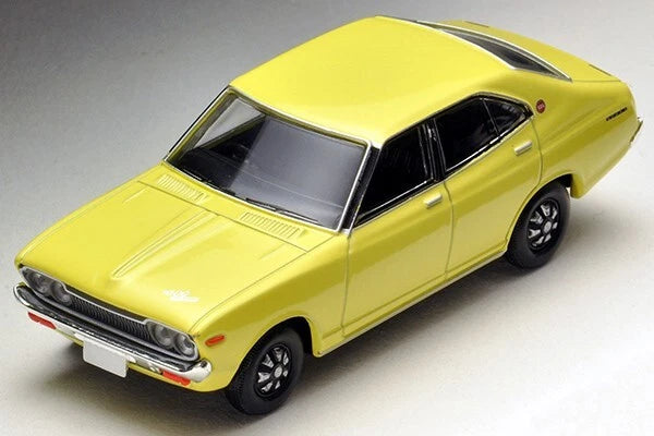 Yellow classic coupe die-cast car model, front three-quarter view with black wheels
