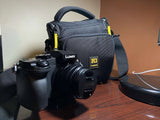 Panasonic Lumix G7. Comes With 14-42 mm lens, Holster Bag and 1 Year Warranty.