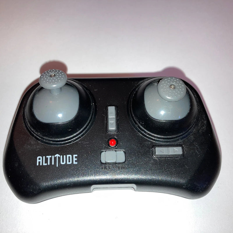 RC drone controller with two thumbsticks and "ALTITUDE" label