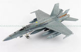 Grey pre-built 1:72 F/A-18A Hornet model aircraft with landing gear and markings