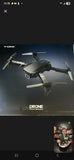 Black YOMI quadcopter drone with camera, four propellers and foldable arms