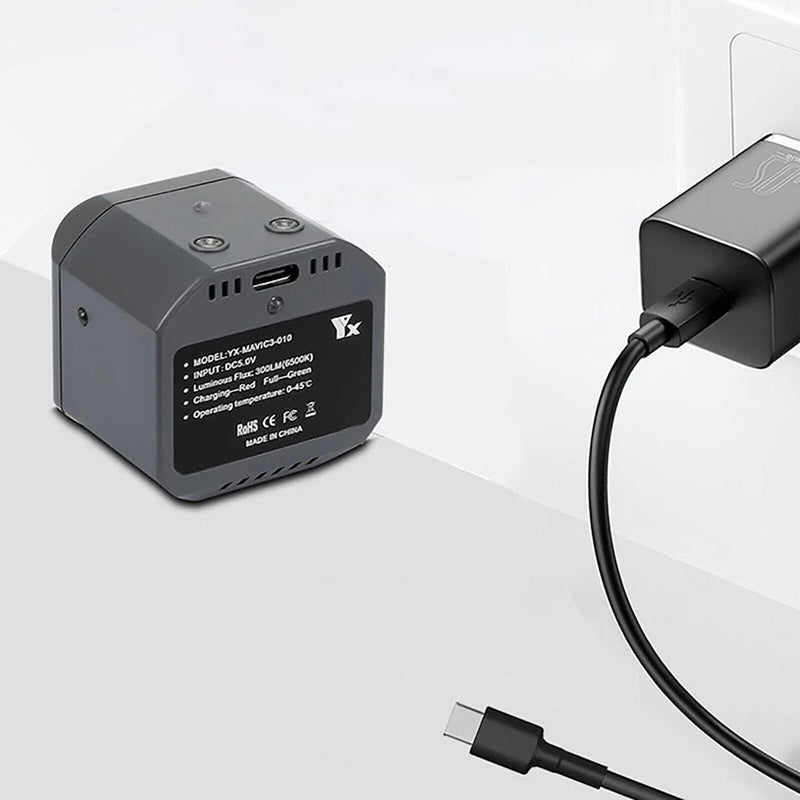 LED searchlight night light unit with USB-C and power ports, gray casing, attached cable