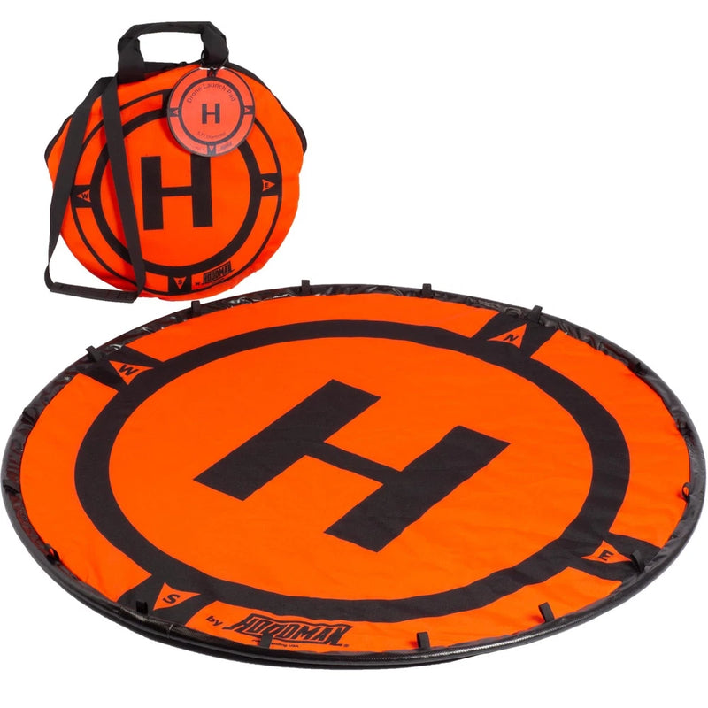 Hoodman Drone play mat, round orange with black center logo and carry handle