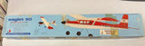 Vintage RC trainer airplane kit box with illustrated prop plane, red and blue accents