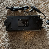 ZBPOWER rechargeable battery pack with ports, caution label, and attached cables