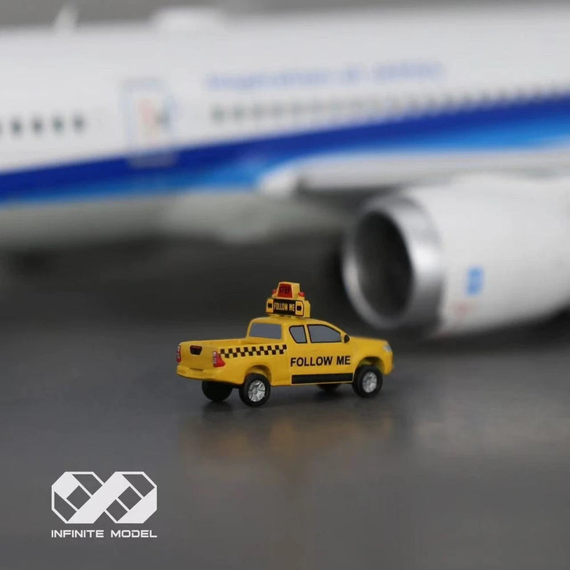 Yellow follow-me airport car 3D model, scale 1/200, printed text on sides