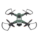 Green quadcopter drone with camera and four black propellers