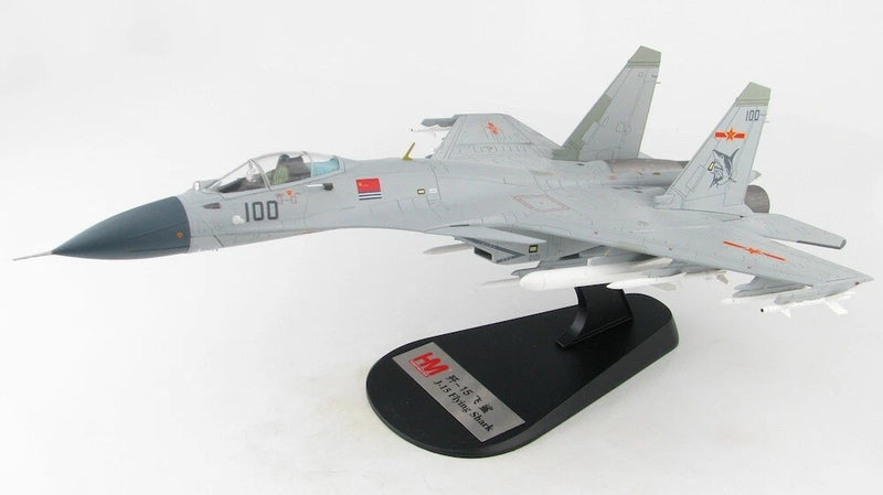 J-15 flying shark model aircraft in light gray on black display stand