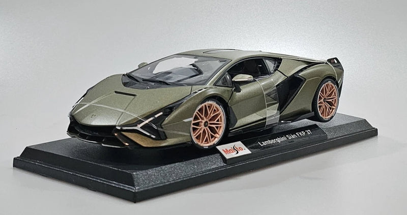 1:18 scale Lamborghini model car with green body, orange wheels, on display base