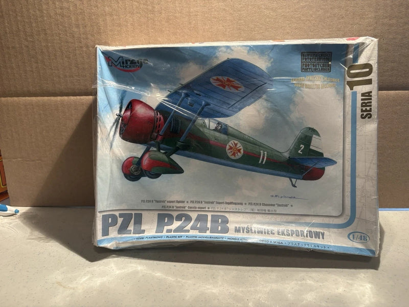 Biplane model airplane kit box with blue and green aircraft artwork, side profile