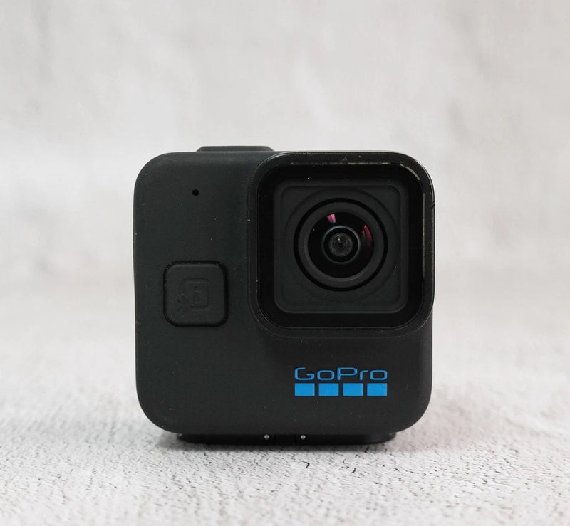 Black GoPro mini action camera with front lens and GoPro logo