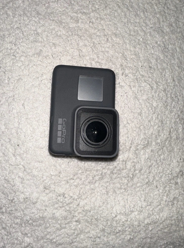 GoPro Hero action camera, black front with lens and small screen window