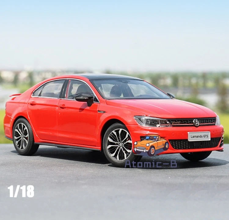 Red 1/18 scale alloy model car, front three-quarter view