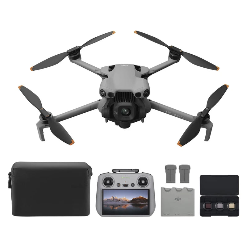 Grey foldable quadcopter drone with camera and propellers, plus controller and cases