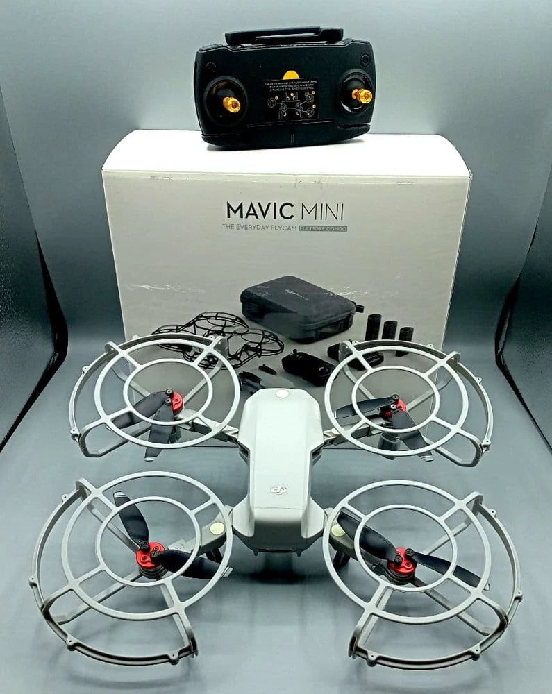 Compact quadcopter drone with four propellers and controller case