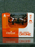 RC micro drone-copter in retail box showing orange and black quadcopter
