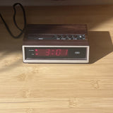 Tozai digital alarm clock with wood case and glowing time display