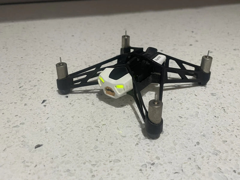 Rolling spider drone with four legs and black body, gray head module