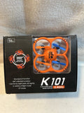 Mini RC quadcopter drone in retail box, orange propeller guards with blue arms