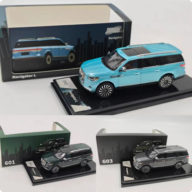 Set of three Lincoln Navigator 1:64 SUV die-cast models in boxed displays