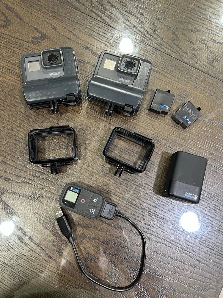 GoPro HERO5 Session pack of 2 with cases, battery pack, and charging cable