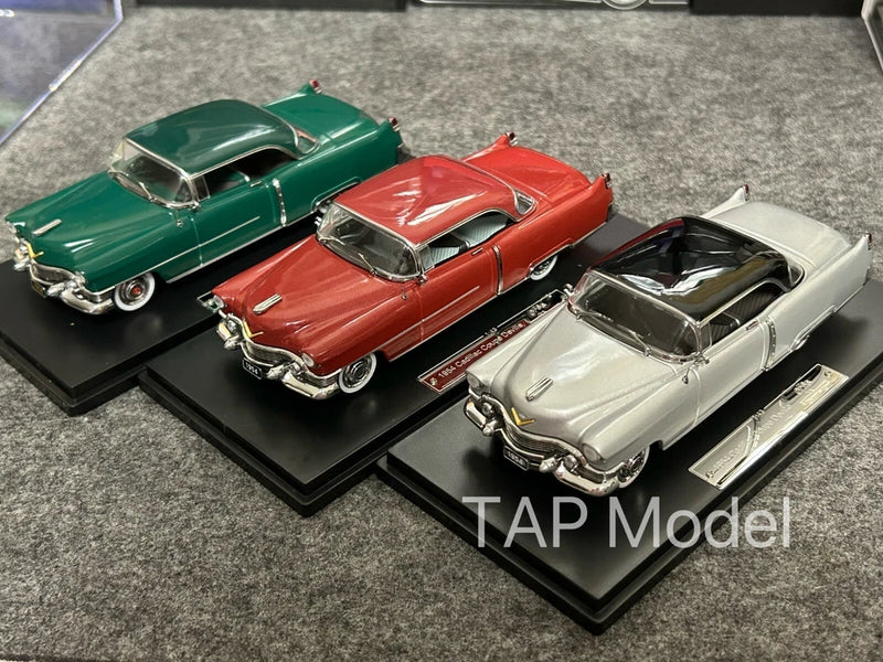 Three die-cast alloy hardtop car models: green, red, and white, 1/43 scale