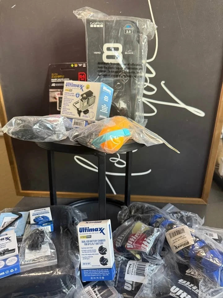 GoPro HERO8 Black action camera bundle with multiple boxed accessories and mounts
