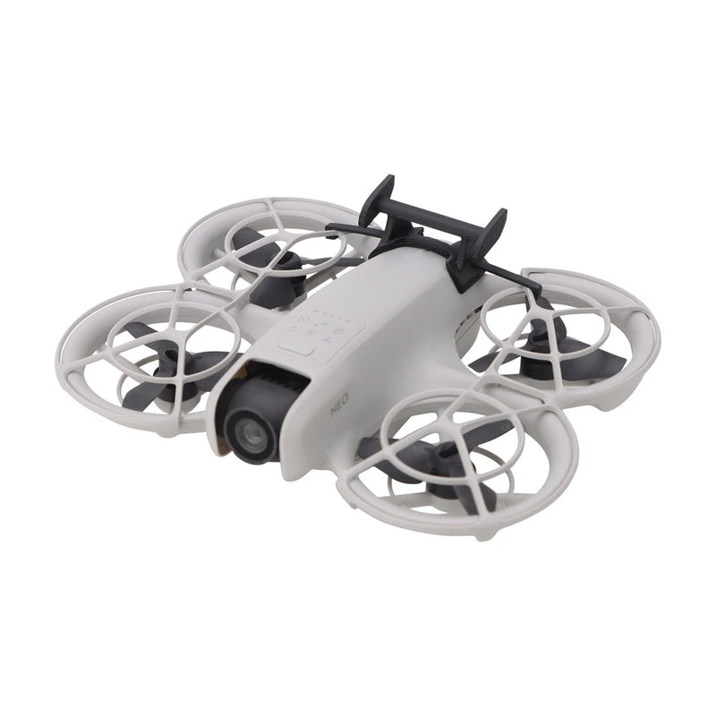 Tail airflow reducing drag mount for DJI Neo, black fin on gray quadcopter