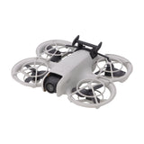 Tail airflow reducing drag mount for DJI Neo, black fin on gray quadcopter
