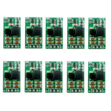 Voltage converter PCB modules with black IC and capacitors on green circuit boards