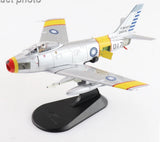 Gray F-86F Sabre 1:72 scale model with yellow tail and wing stripes, on display base
