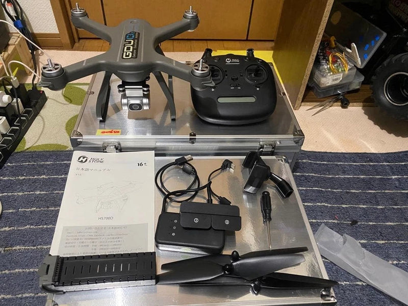 FPV drone with 1080p HD camera, controller, and accessories