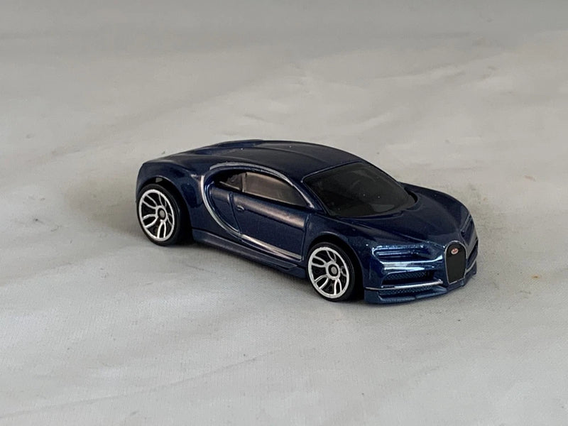 Hot Wheels Bugatti Chiron toy car in dark blue and black with silver wheels