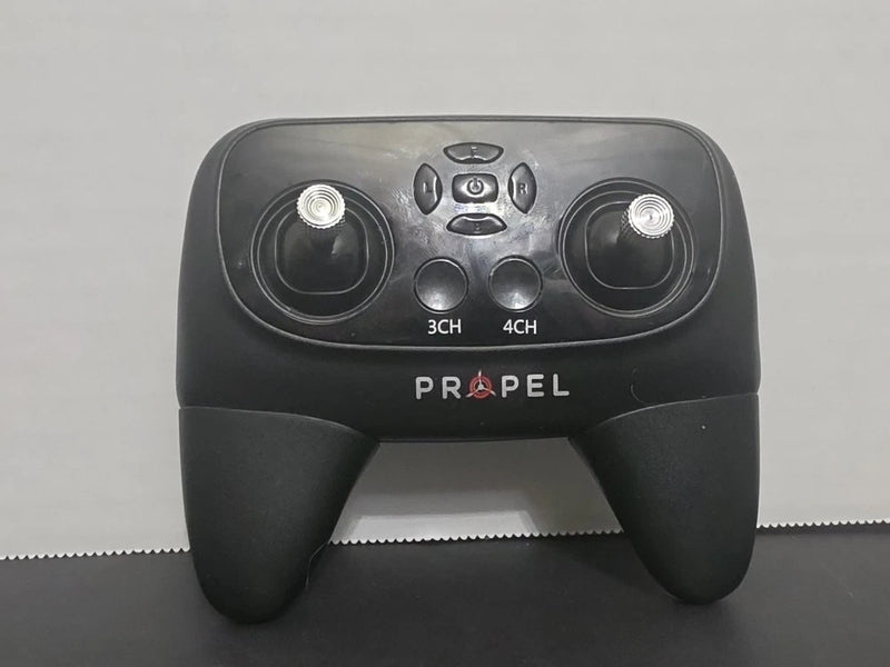 Propel black drone remote control with dual joysticks and button layout
