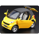 1:24 yellow Smart Fortwo diecast toy car with open door, detailed wheels