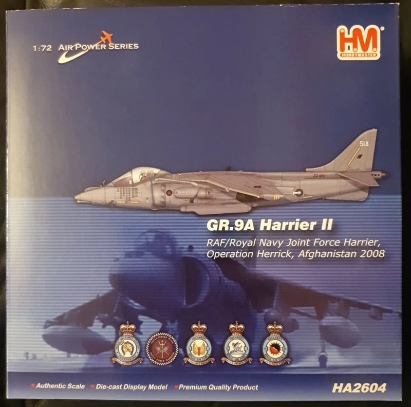 Boxed die-cast Harrier II model: light gray RAF-style jet with side profile and roundels.