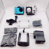 Blue sport action camera and waterproof housing with mounts, case parts, and USB charger.