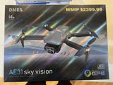 Four-axis aerial drone with HD camera and GPS, shown on retail box