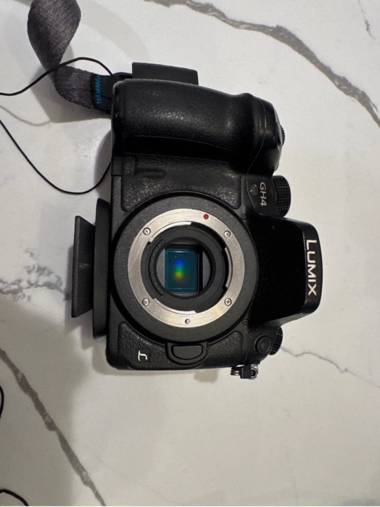 Panasonic Lumix GH4 16MP 4K w/ 3 Lumix lens (20, 12-35, 35-100mm)