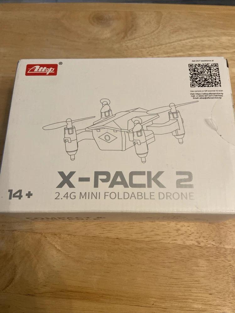 Foldable mini drone box labeled X-PACK 2, 2.4G, kids beginner