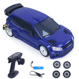 Blue RC drift car kit with controller, battery, USB cable, and four spare tires